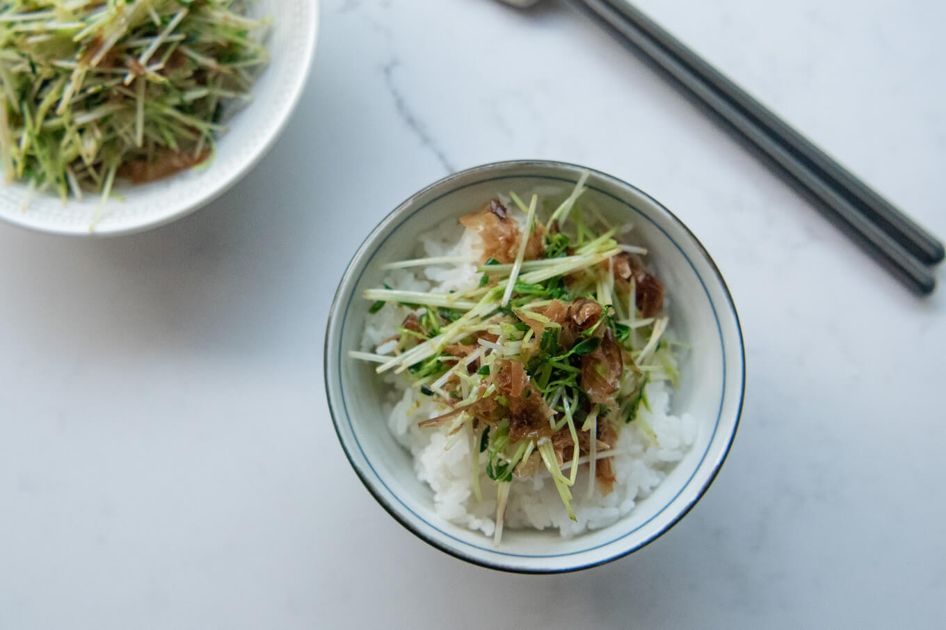 Stir-fried Snow Pea Sprouts on rice.