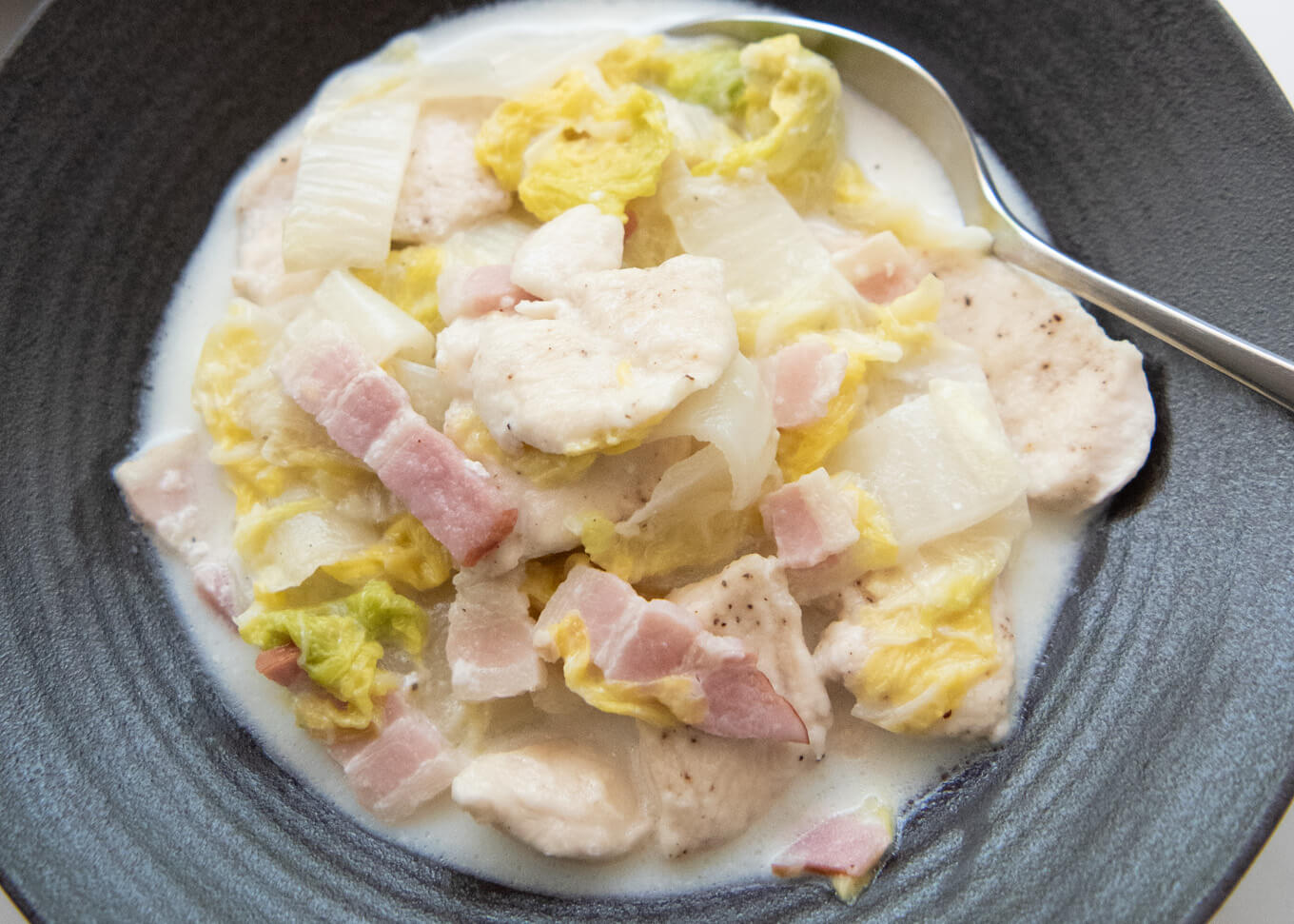 Top-down photo of Chicken & Cabbage Simmered in Milk.