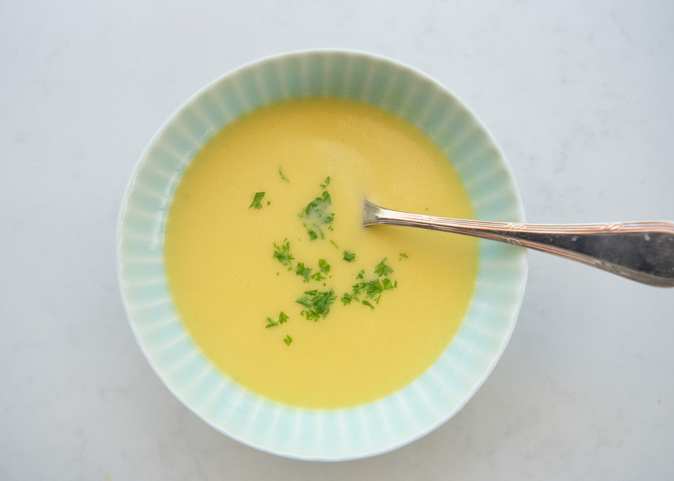 Top-down photo of Japanese-style Sweet Corn Soup (Corn Surinagashi).