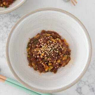 Top-down hero shot of Spicy Tuna Tatare with Pickled Daikon.