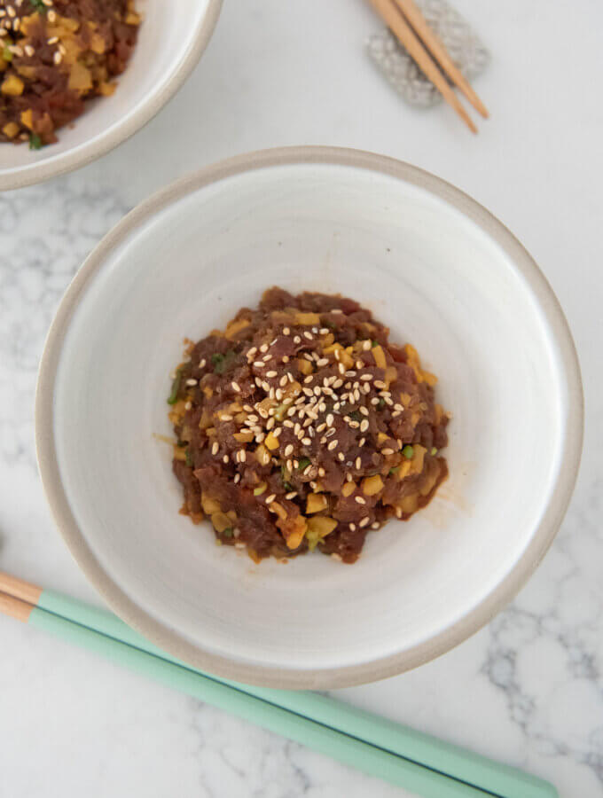 Top-down hero shot of Spicy Tuna Tatare with Pickled Daikon.