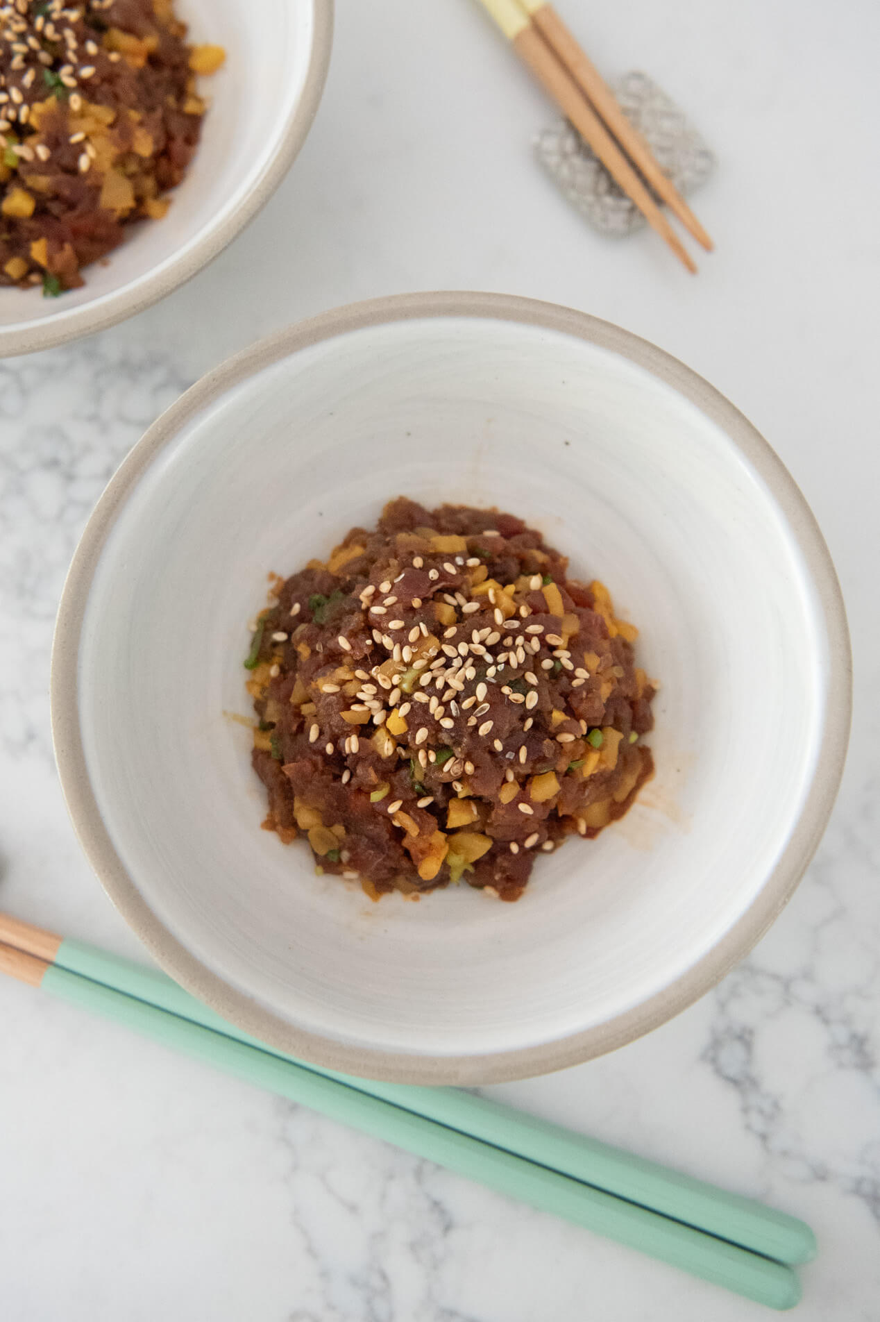 Top-down hero shot of Spicy Tuna Tatare with Pickled Daikon.