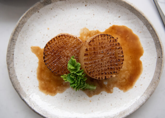 Top-down photo of Daikon Steak with Garlic Butter Soy Sauce.