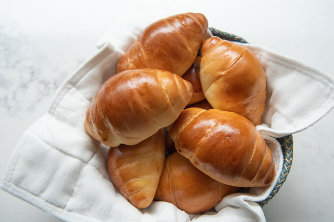 Freshly baked Japanese Butter Rolls in a basket.
